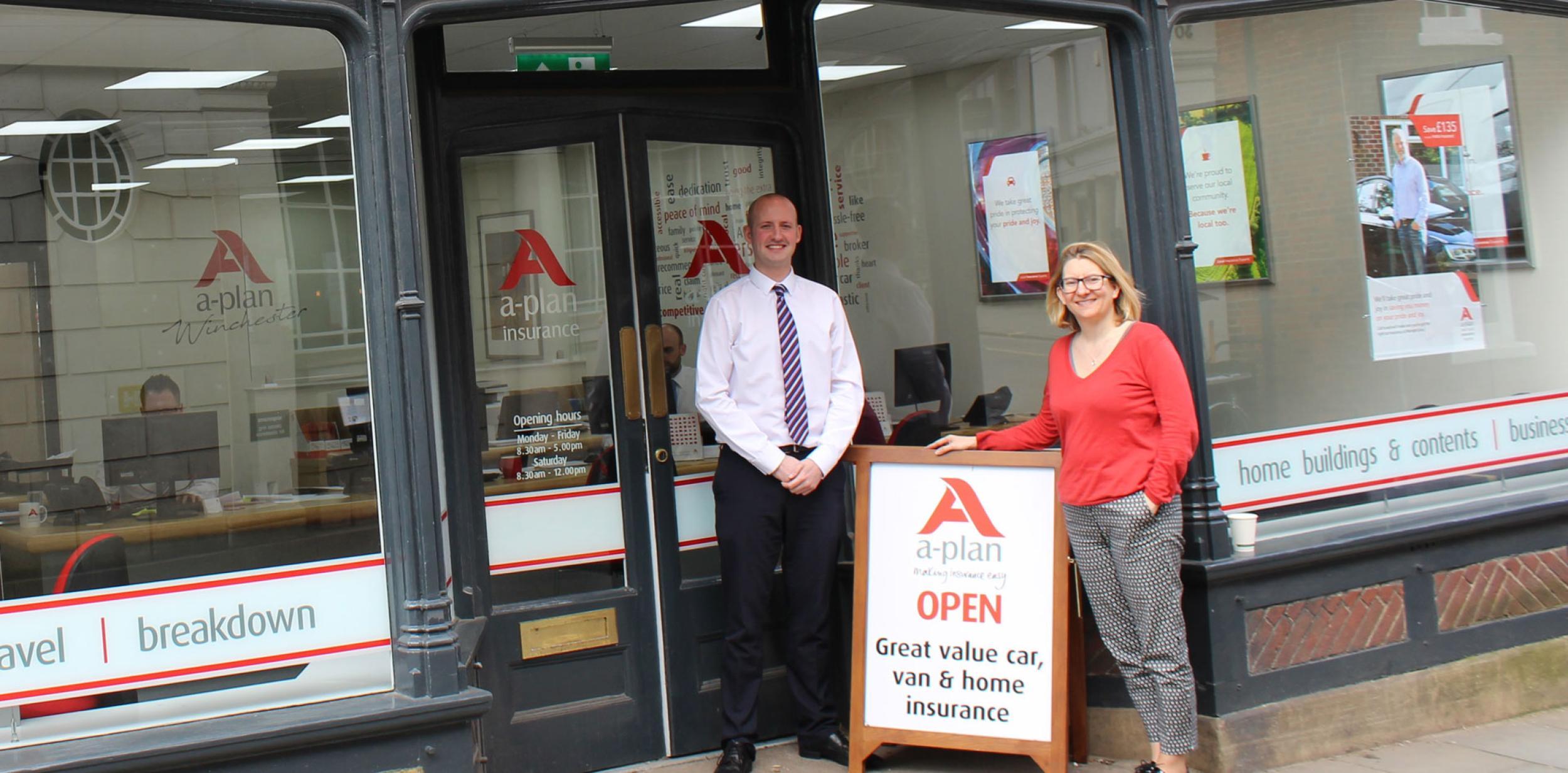 A-Plan's Ian Tuffrey standing outside the branch with Play to the Crowd's Kirstie Mathieson