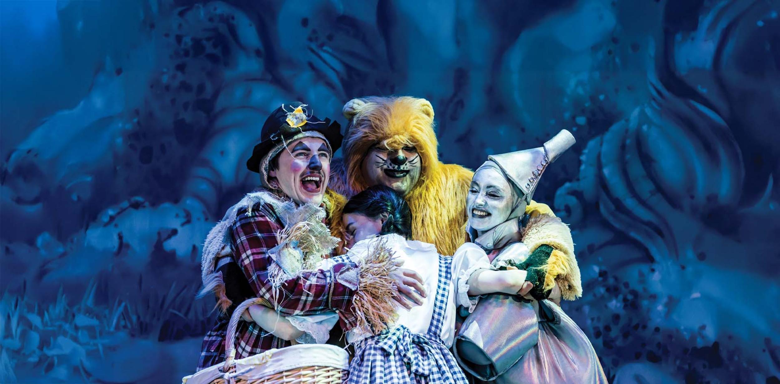 Wizard of Oz characters hugging