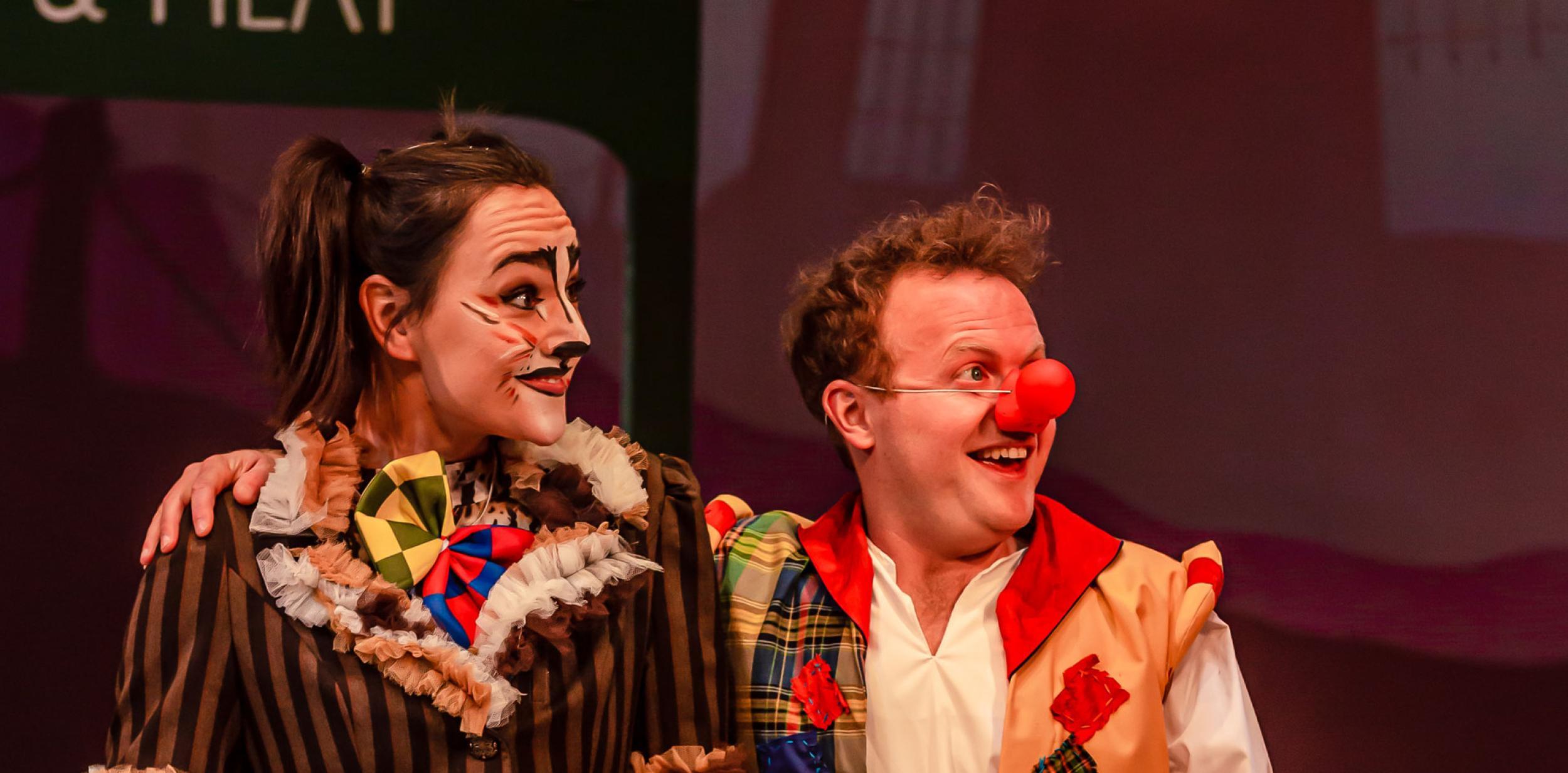 Panto characters smiling with surprise