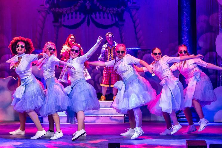 Young performers dancing on stage