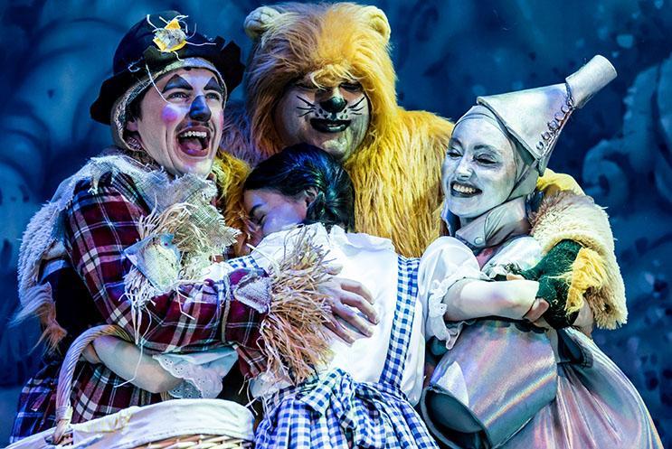 Wizard of Oz characters hugging