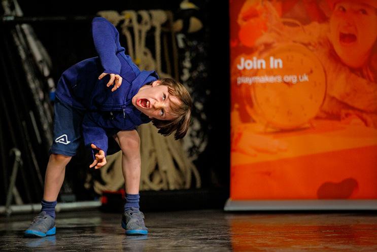 boy performing on stage