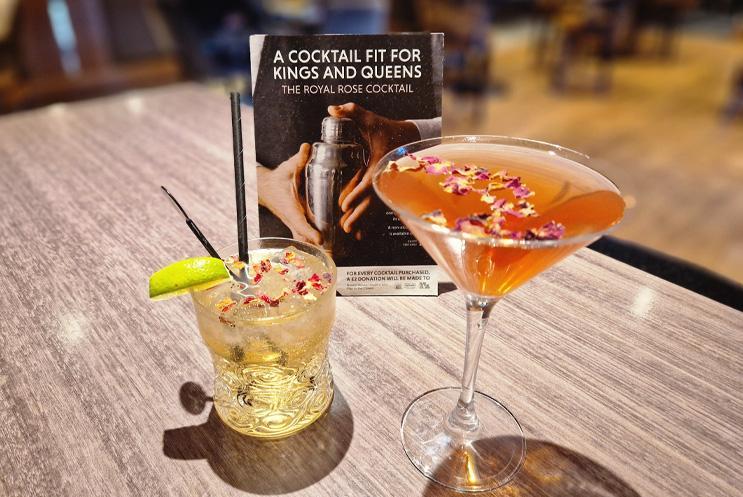 Cocktails, one in a short glass, the other in a tall glass.