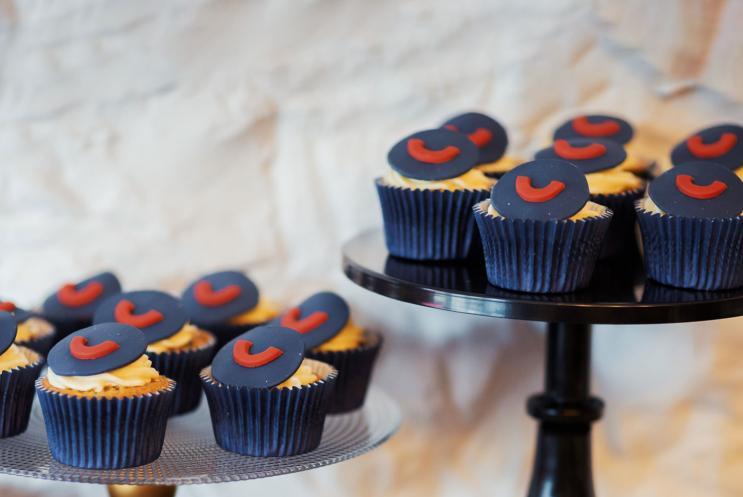 Cup cakes with smiles on them