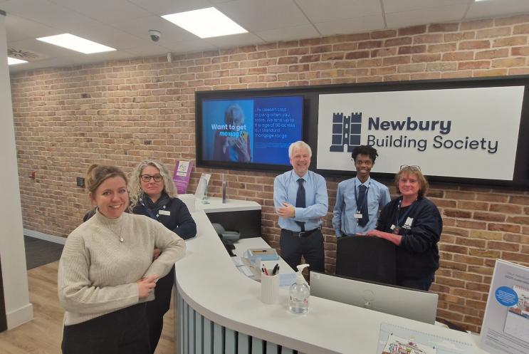 Members of Play to the Crowd and Newbury Building Society pose for a photo