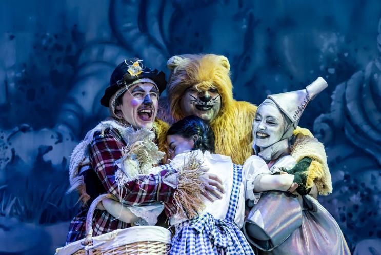 Panto cuddle with Dorothy, the Scarecrow, the Tinman and the Lion all hugging