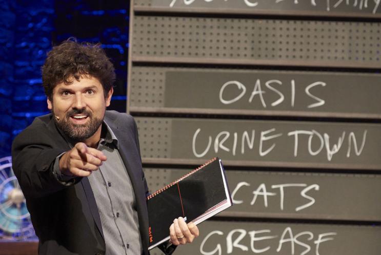 Man holding a folder and pointing